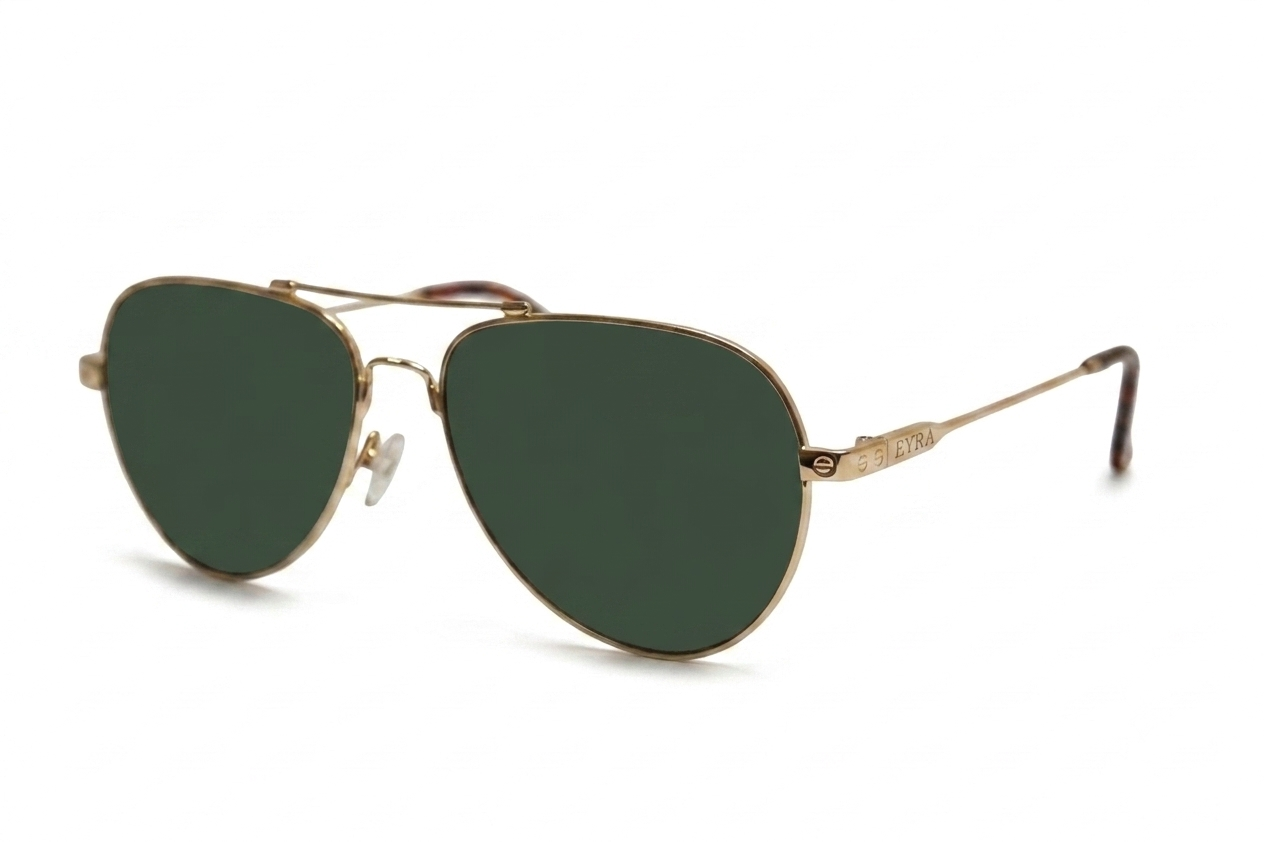 Gold-framed sunglasses with green lenses on a white background