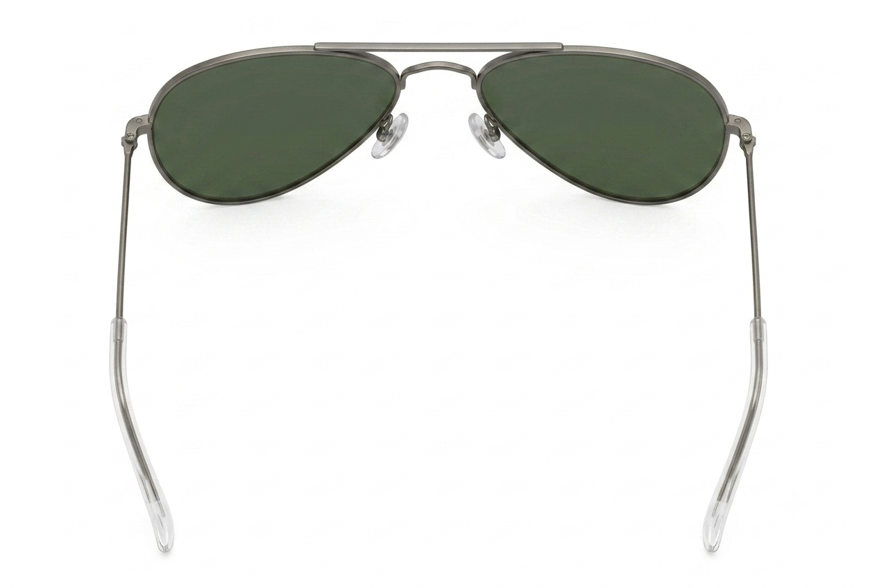 Aviator sunglasses with green lenses on a white background