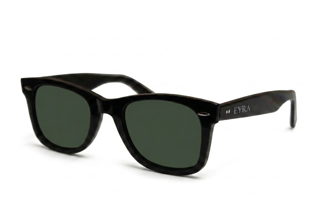 Black sunglasses with green lenses on a white background