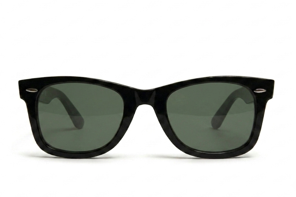 Black sunglasses with dark lenses on a white background