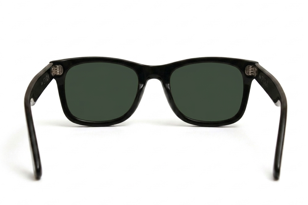 Black sunglasses with dark lenses on a white background
