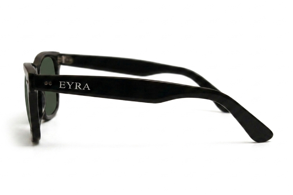 Black sunglasses with 'EYRA' branding on a white background