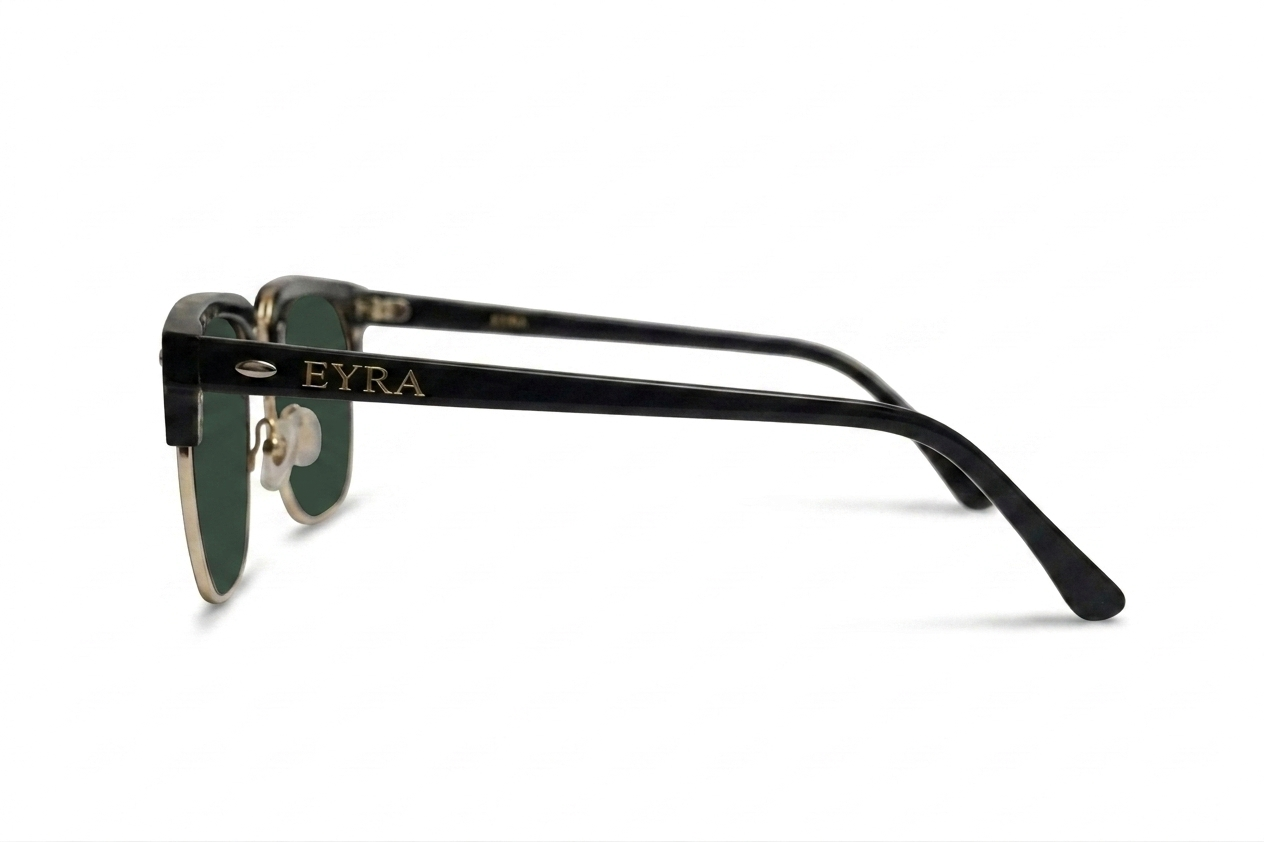 Black eyeglasses with 'EYRA' branding on a white background