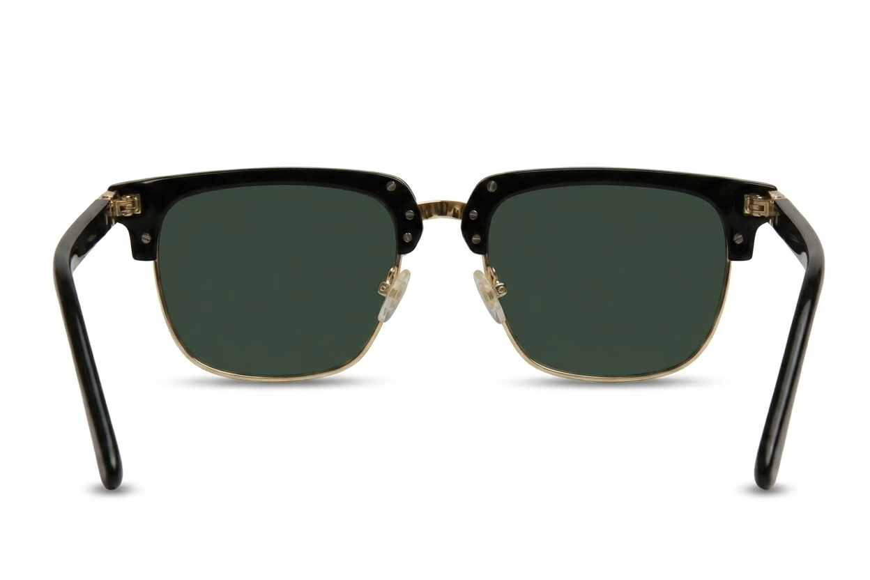 Black-framed sunglasses with gold accents on a white background