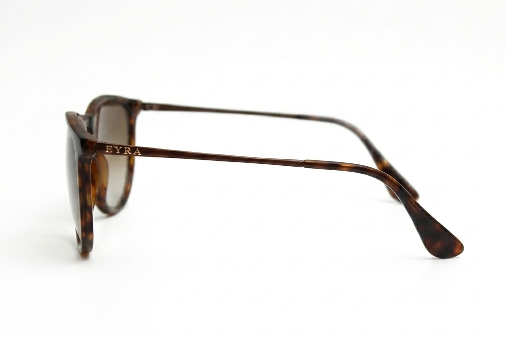 Sunglasses with tortoiseshell frame on a white background