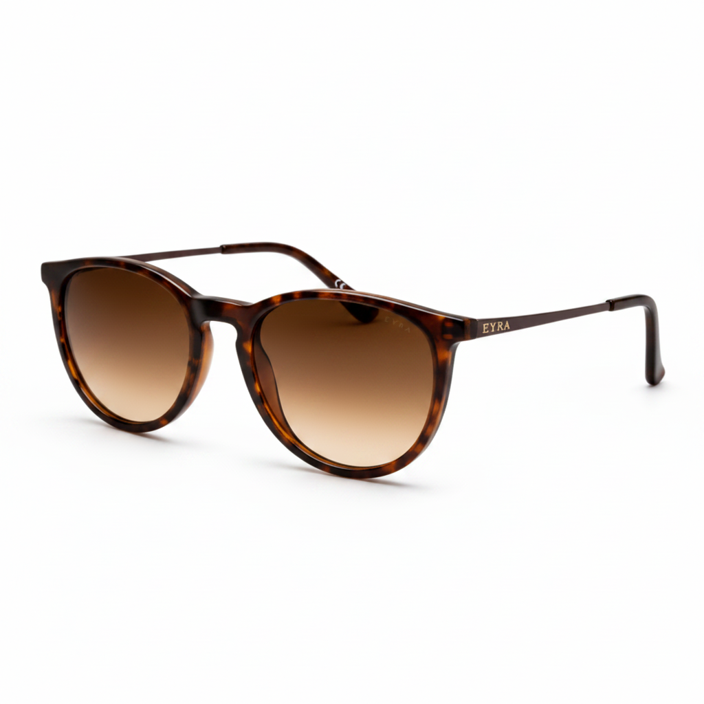 Sunglasses with tortoiseshell frame and gradient lenses on a white background